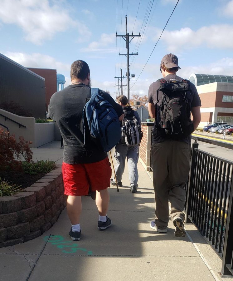 Students walk through campus on a recent afternoon. Many students are facing challenges during this unusual semester.