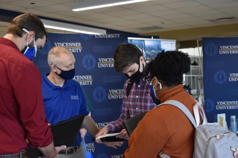 Employers talk with students about their job opportunities during a recent Career Fair on campus.