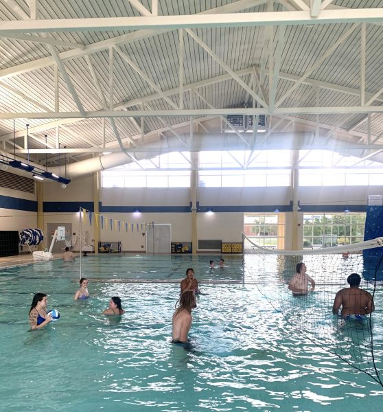 Students swim into fall season with reopening of indoor pool