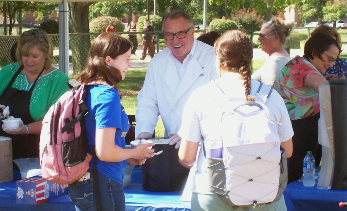 VU President Dr. Chuck Johnson serves up ice cream at his annual Ice Cream Social.