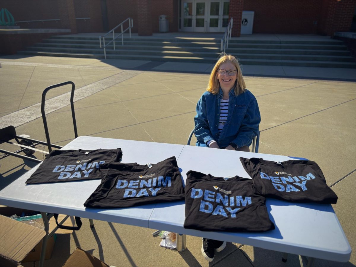 Kathleen Evans, a mental health counselor at the Vincennes University Counseling Center, sells t-shirts for Denim Day, a way to raise awareness for sexual violence.